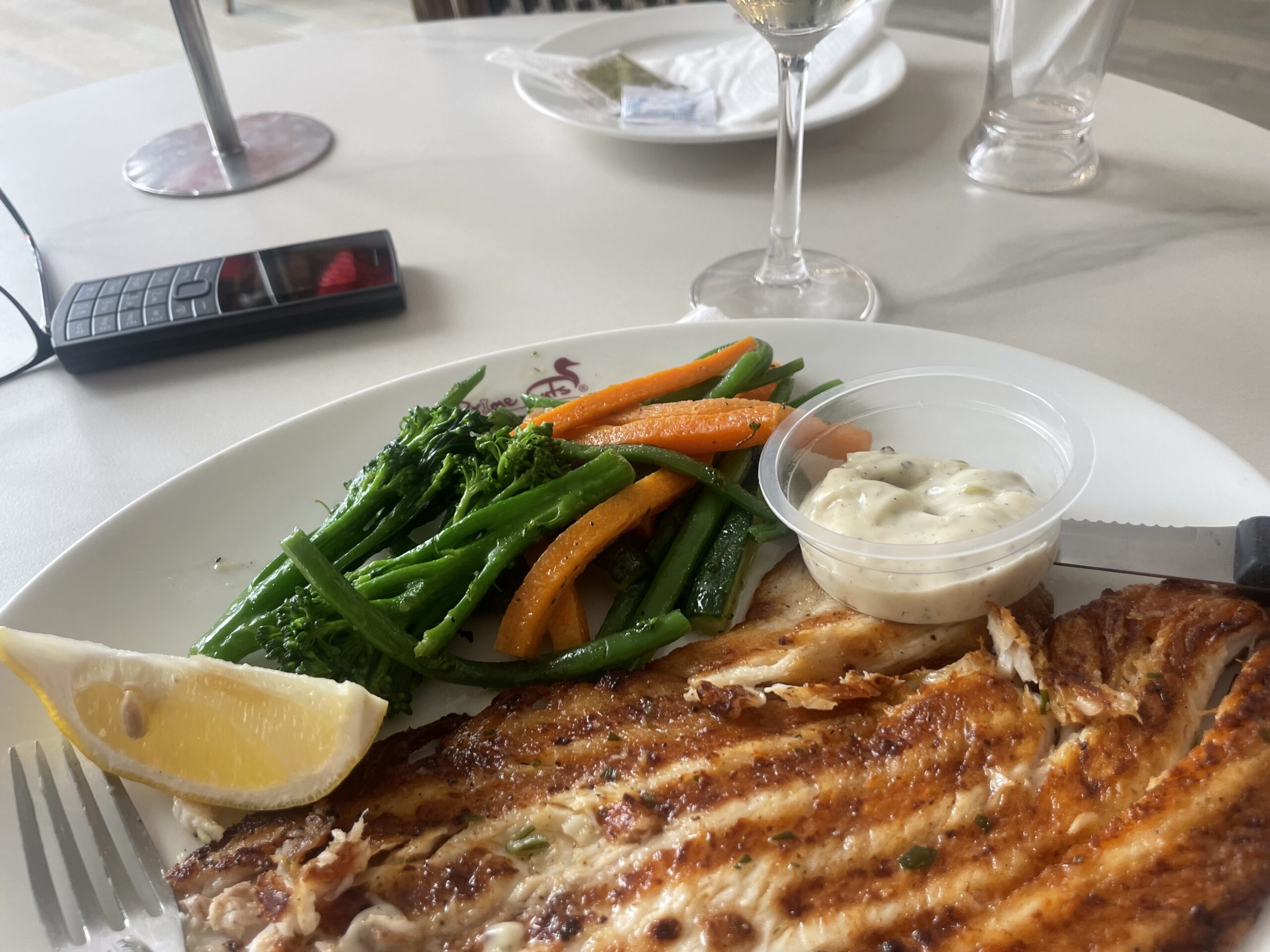 Grilled fish fillet with seasonal vegetables at Home Bliss